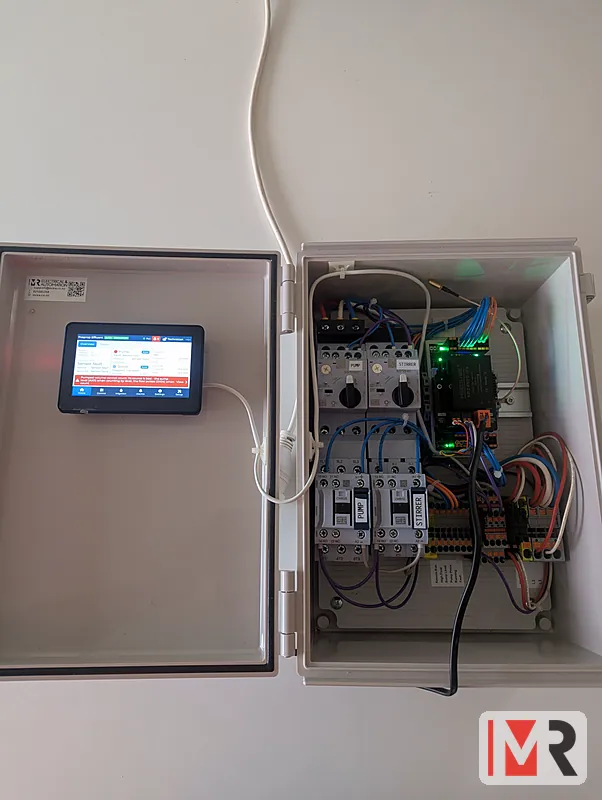 A ModBee touchscreen pump controller with its contactors