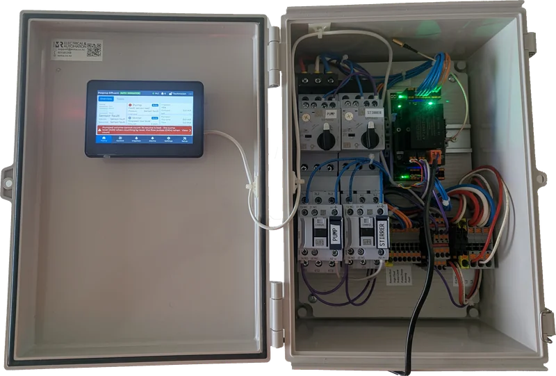 A ModBee pump controller open, touchscreen showing the overview page, with motor starters inside